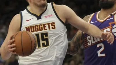 Jokic falls assist short of triple-double in his 3 quarters in Nuggets' 122-105 victory over Suns