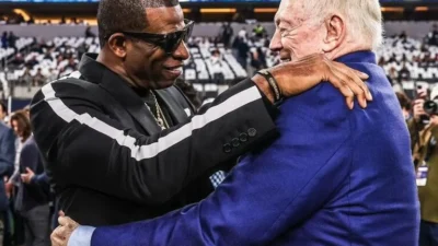 What Is Jerry Jones Whispering to Deion Sanders at Super Bowl?