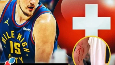 BREAKING: Nuggets' Nikola Jokic seen limping, ble*ding early in contest vs. Celtics