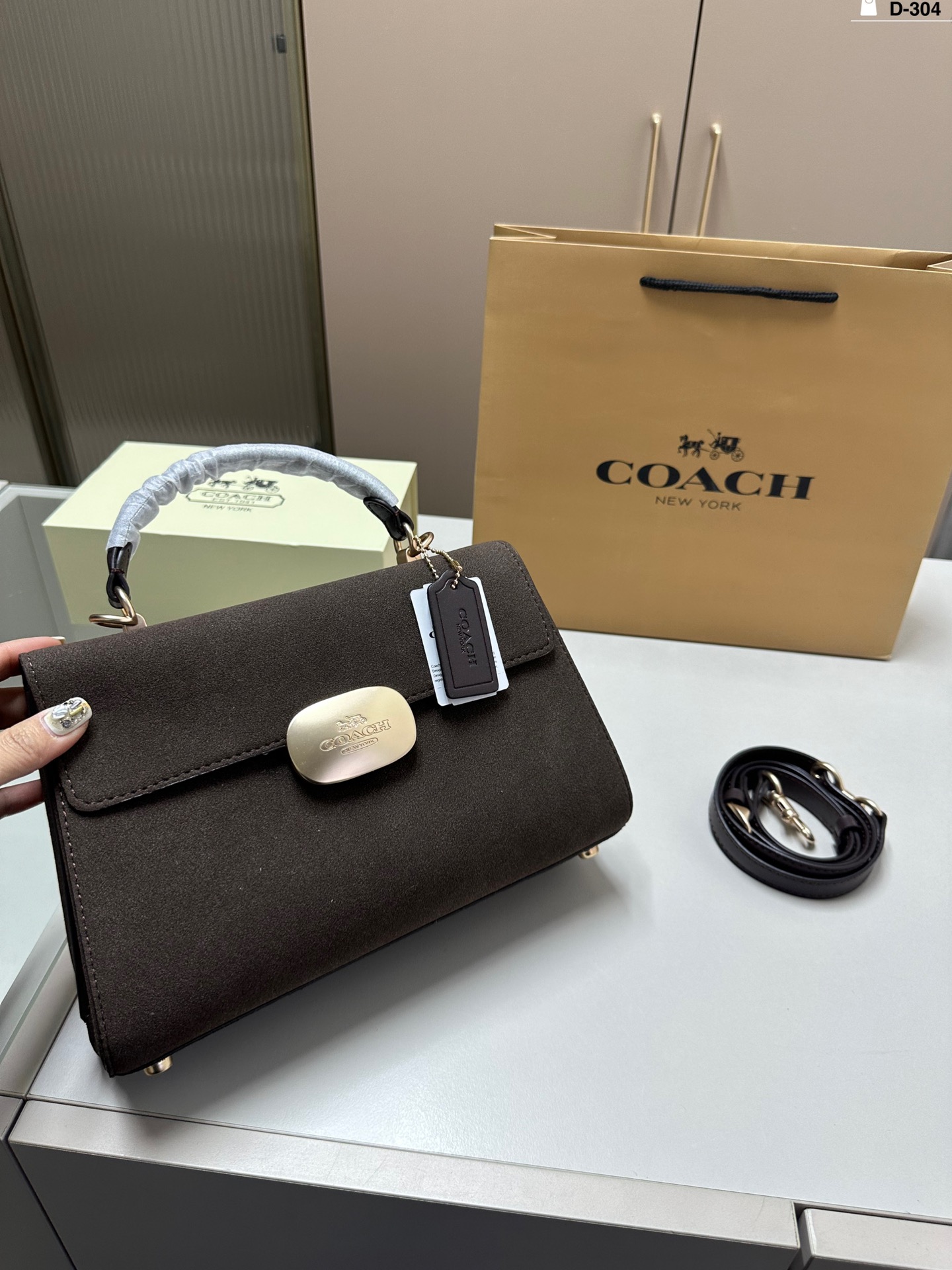 25273-COACH-$68 gallery