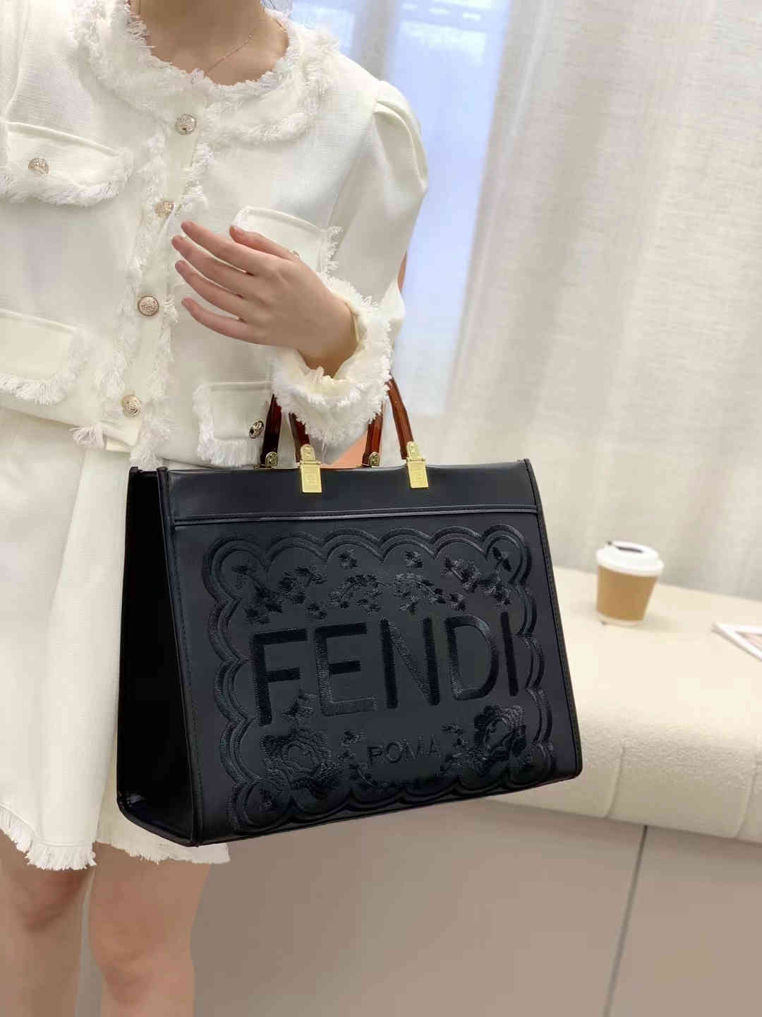 40$  Prada   4454-M gallery