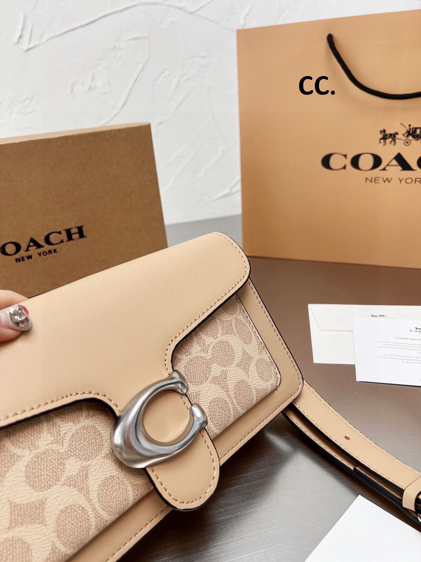 53.42$ COACH   CODE   306-6973-R gallery