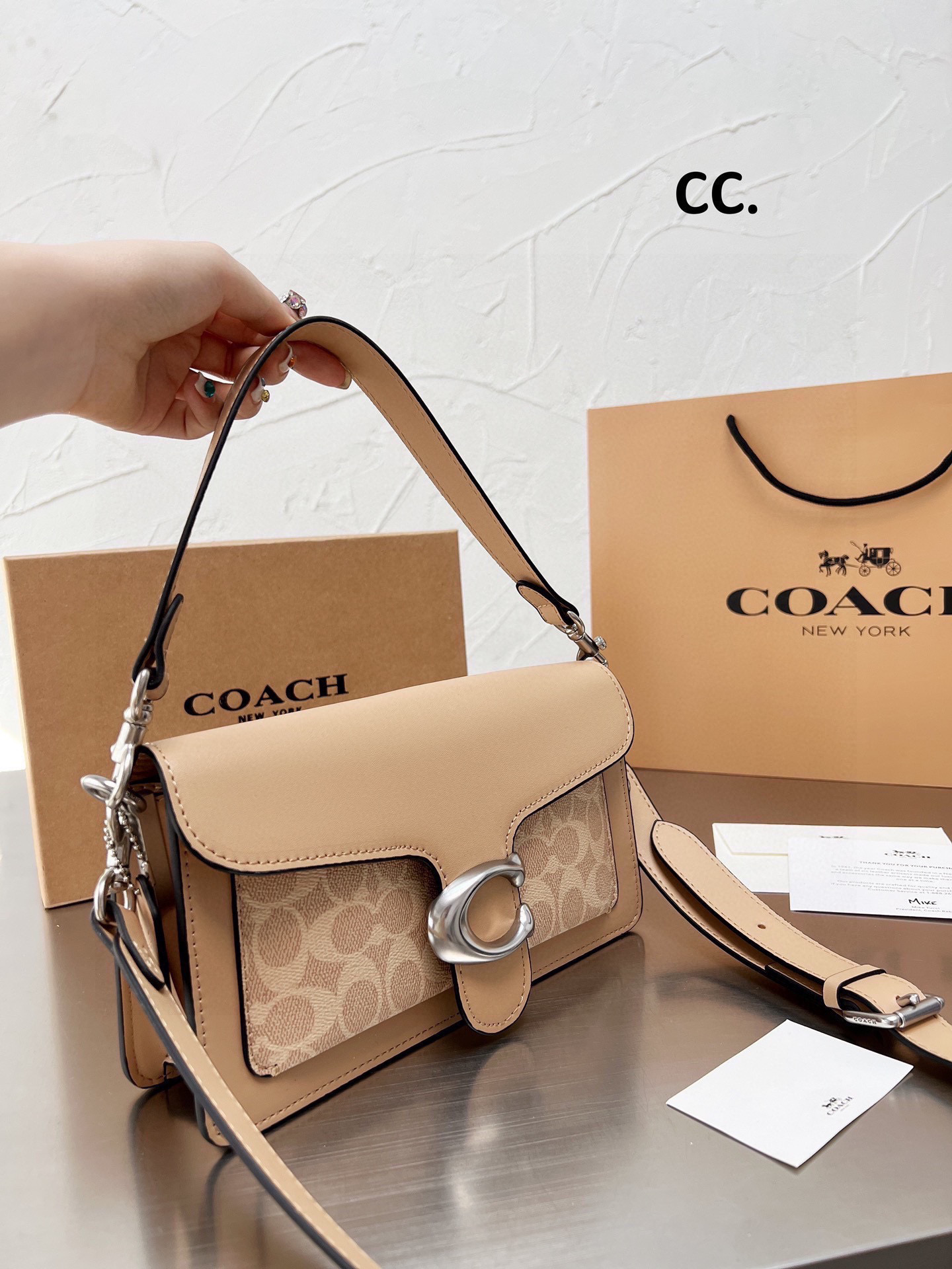 53.42$ COACH   CODE   306-6973-R gallery