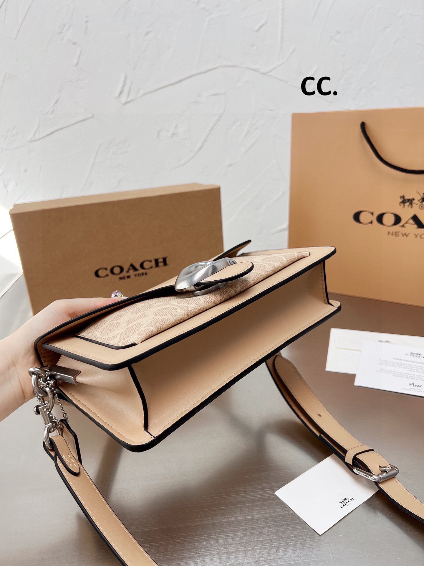 53.42$ COACH   CODE   306-6973-R gallery