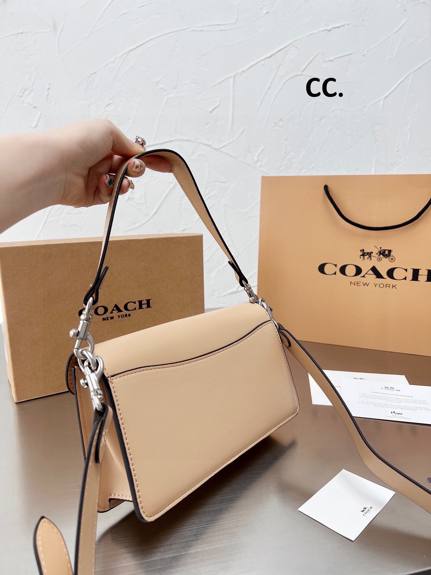 53.42$ COACH   CODE   306-6973-R gallery