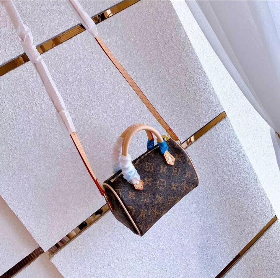 9395-T    LV pillow bag  36$ gallery