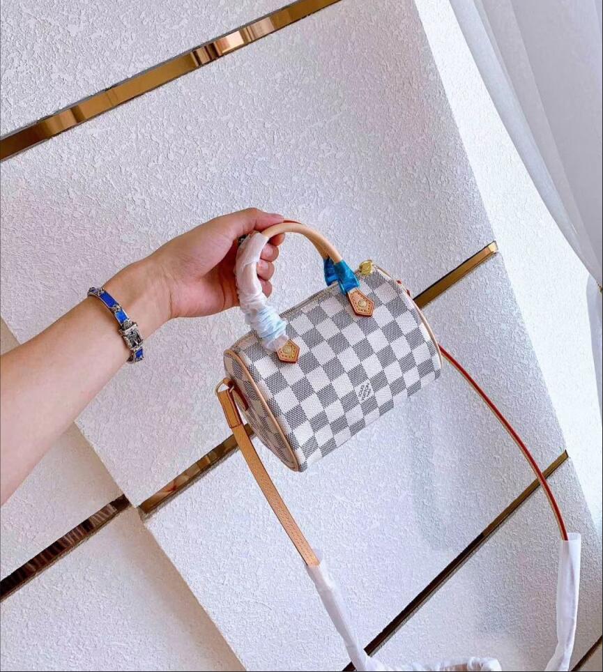 9395-T    LV pillow bag  36$ gallery