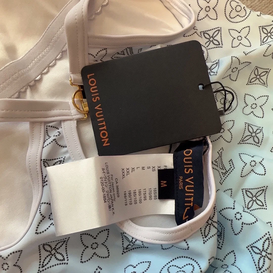 LV $30 gallery