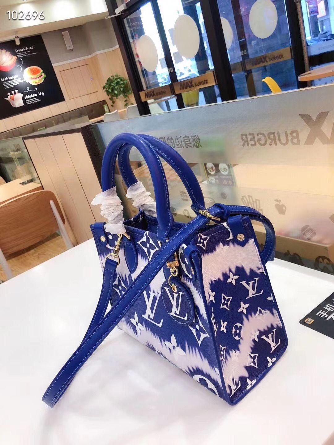 LV $57 gallery