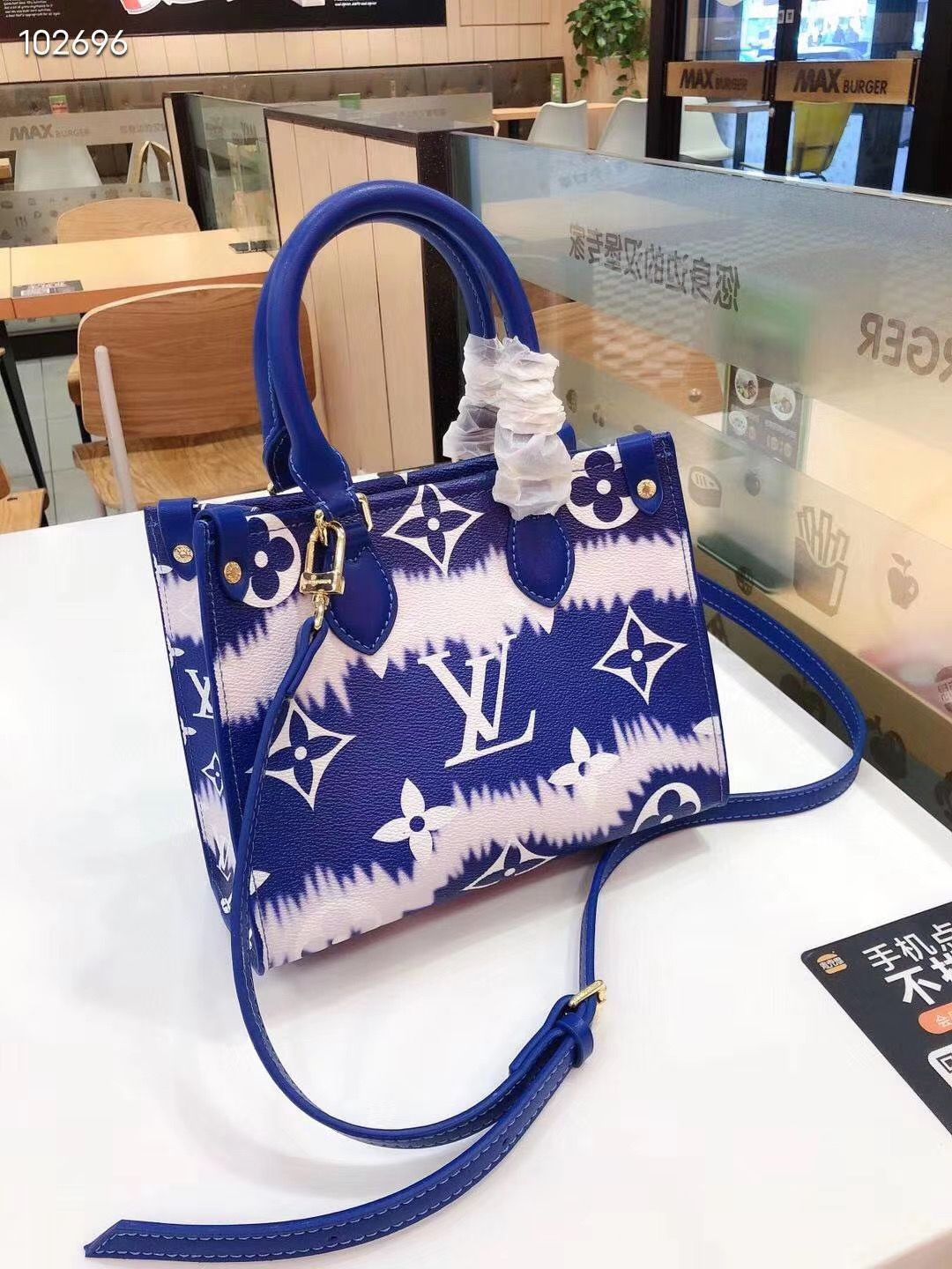 LV $57 gallery