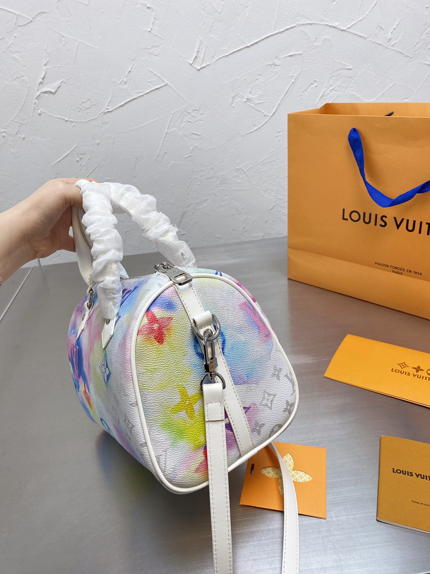 LV $63 gallery