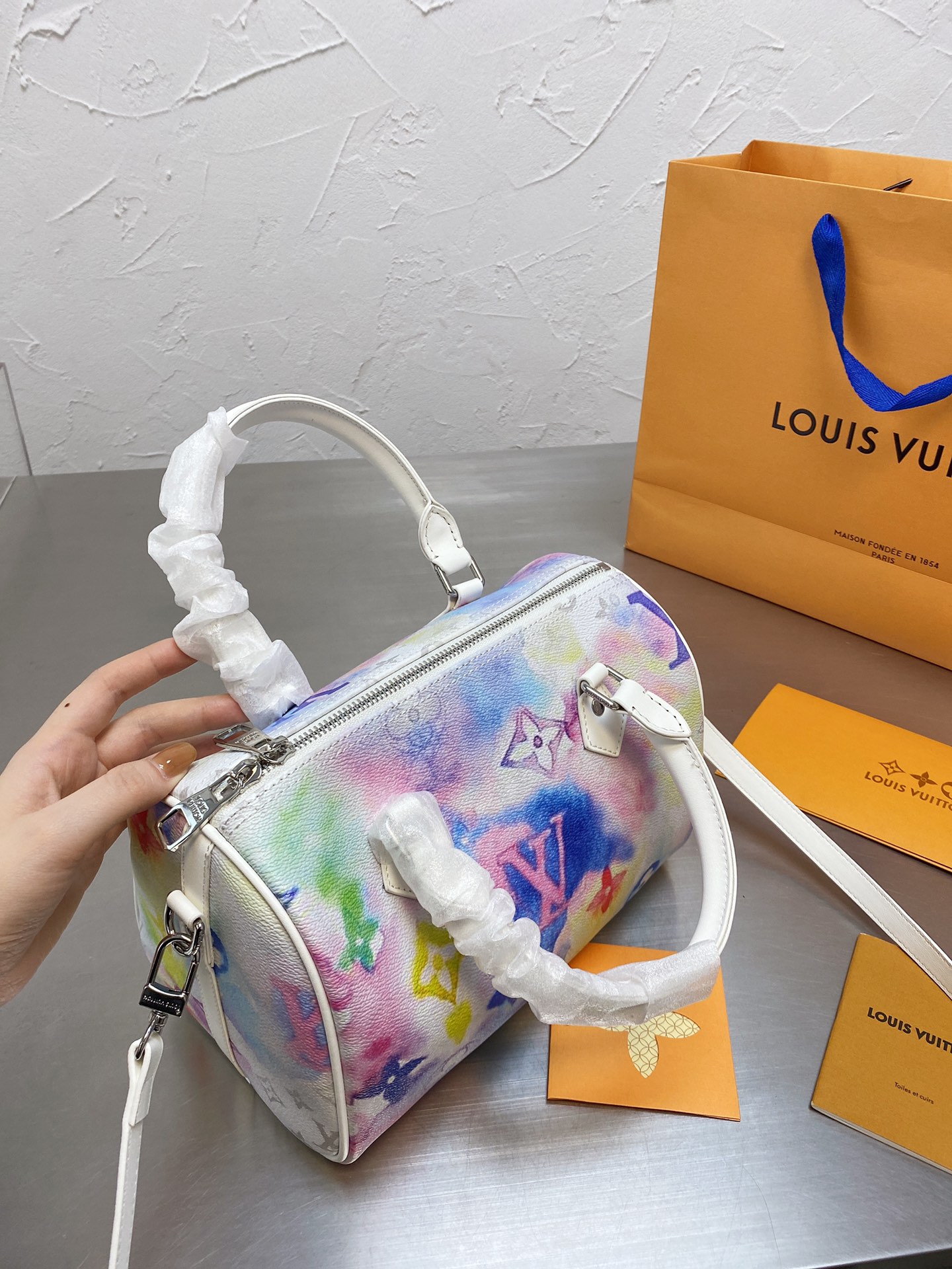 LV $63 gallery