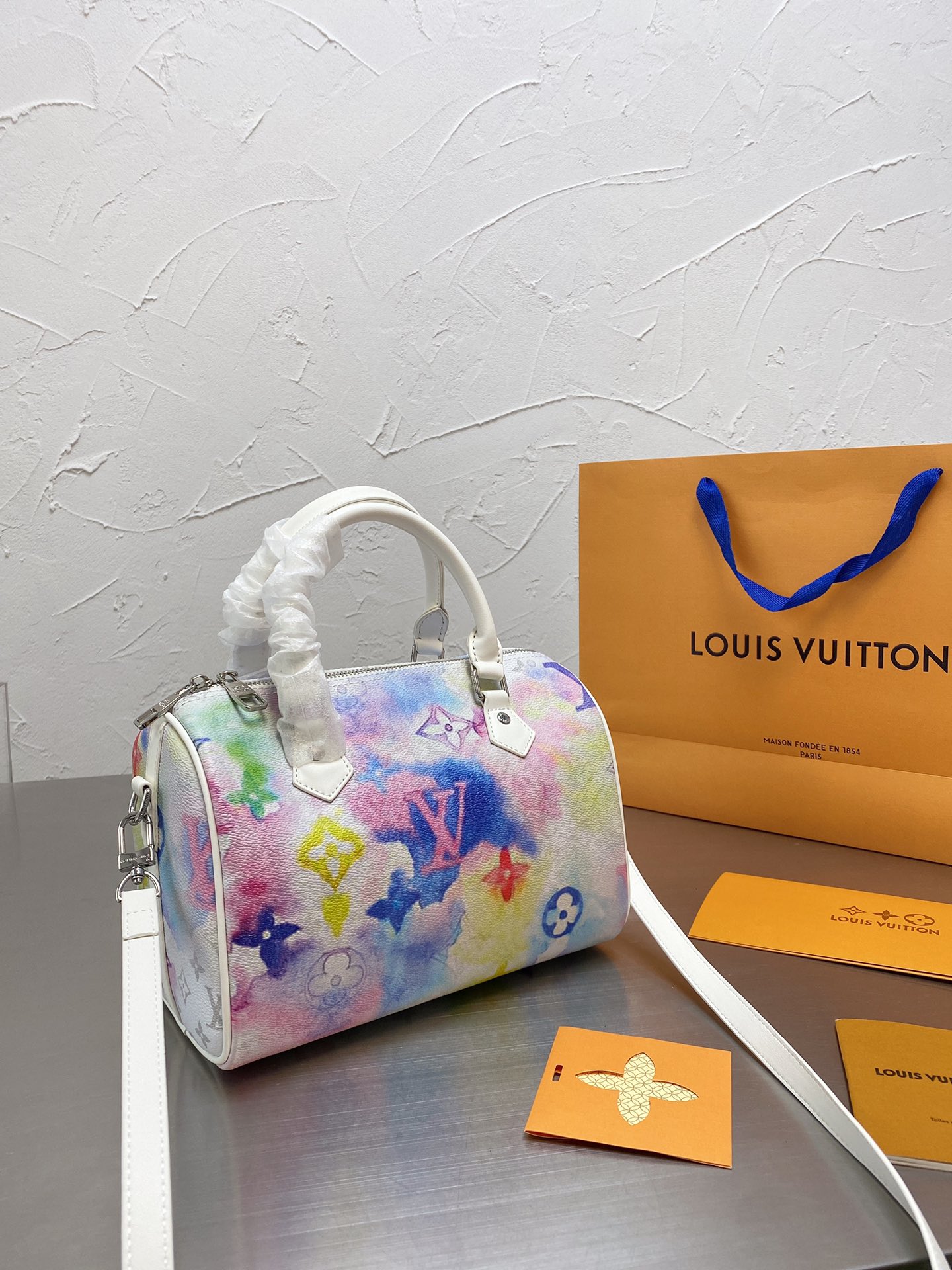 LV $63 gallery