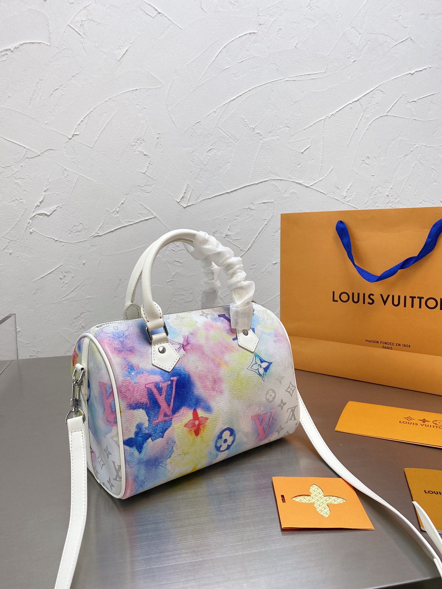 LV $63 gallery