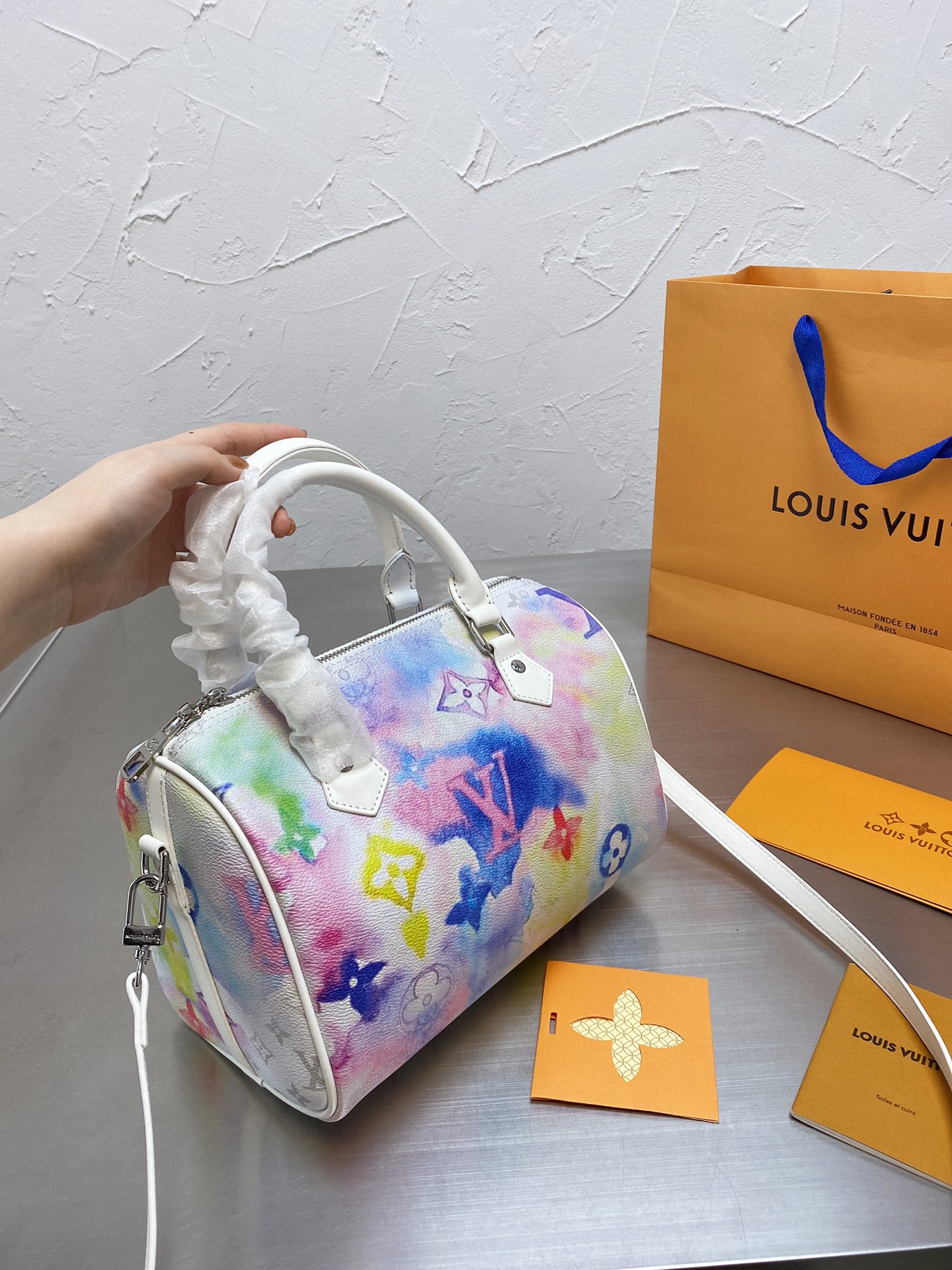 LV $63 gallery