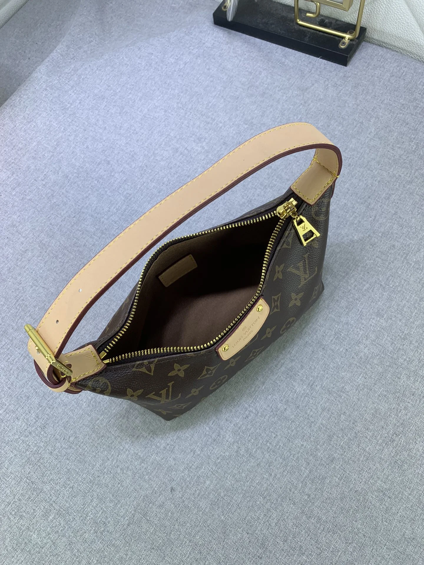 LV $65 gallery