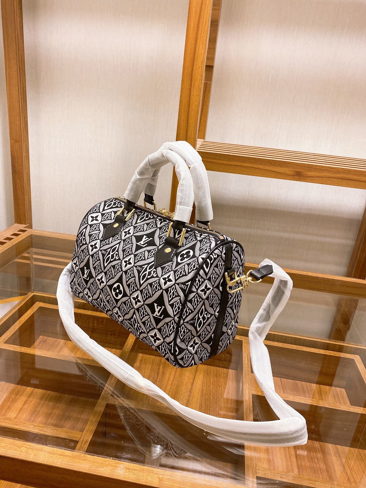 LV $65 gallery