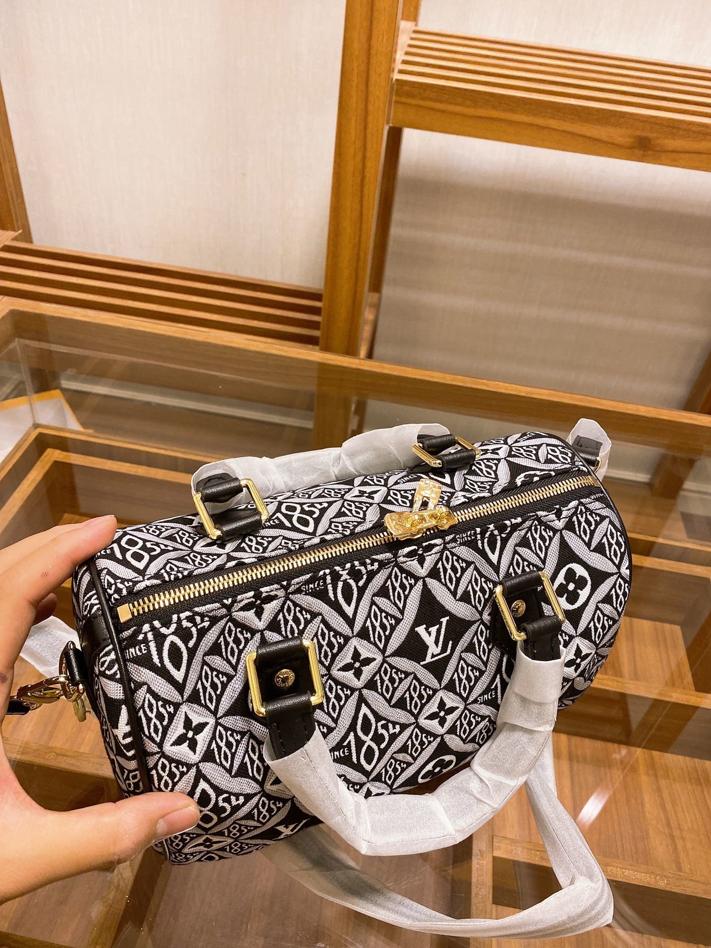 LV $65 gallery