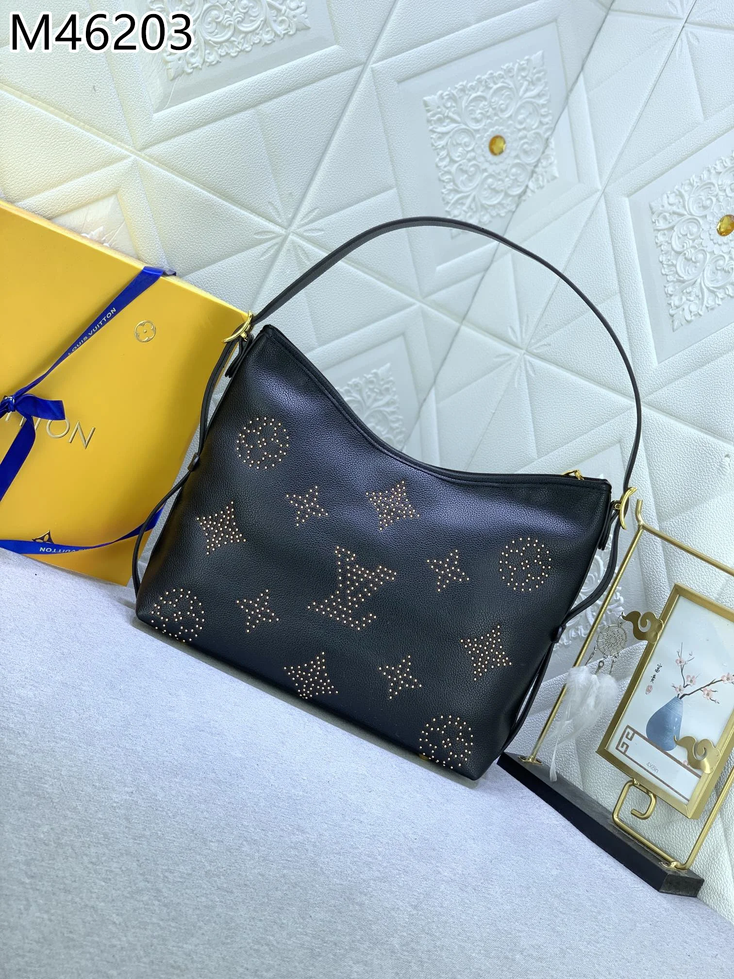 LV $74 gallery