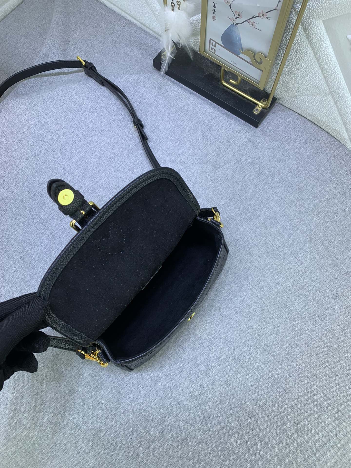 LV $74 gallery