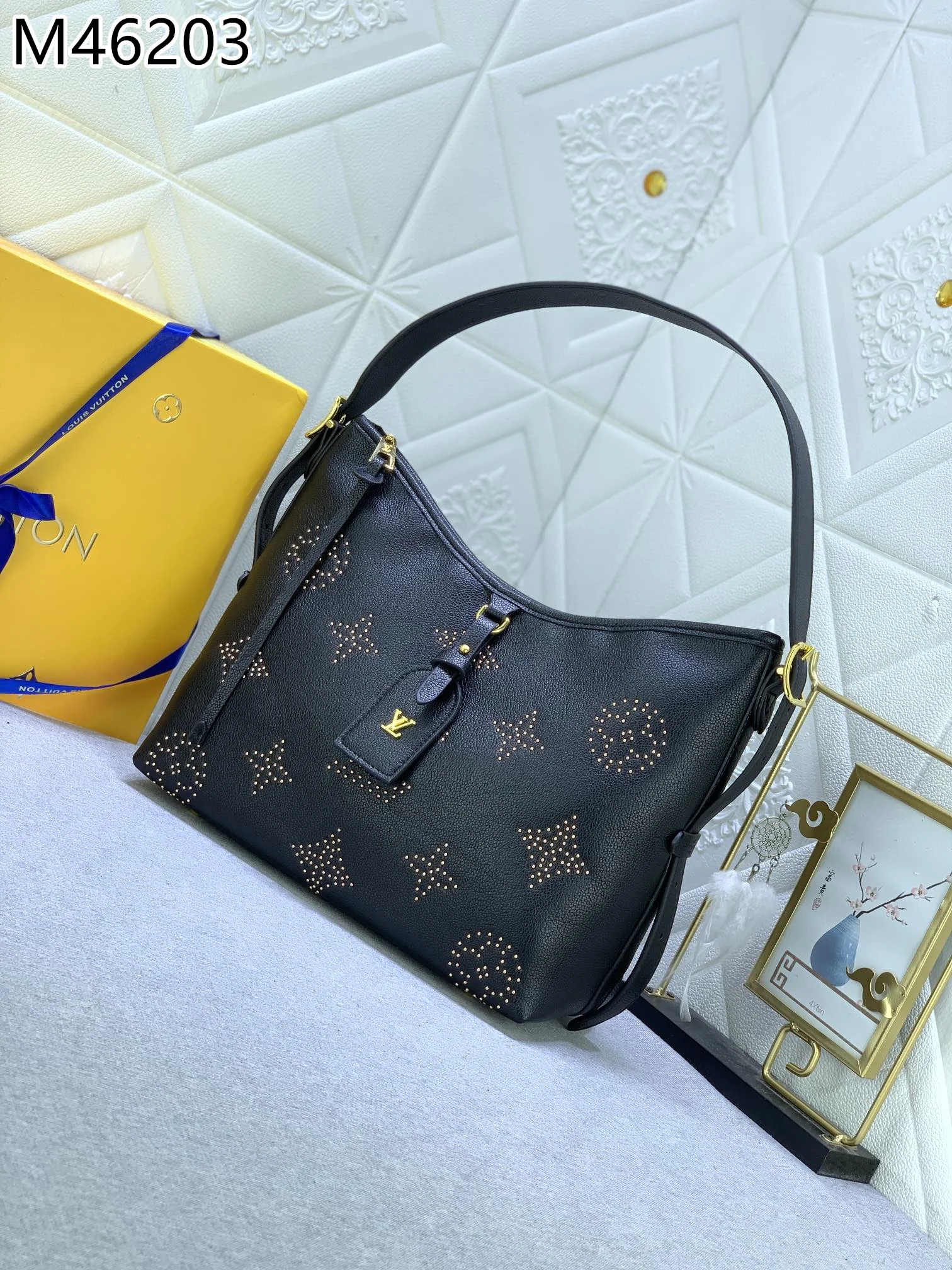 LV $74 gallery