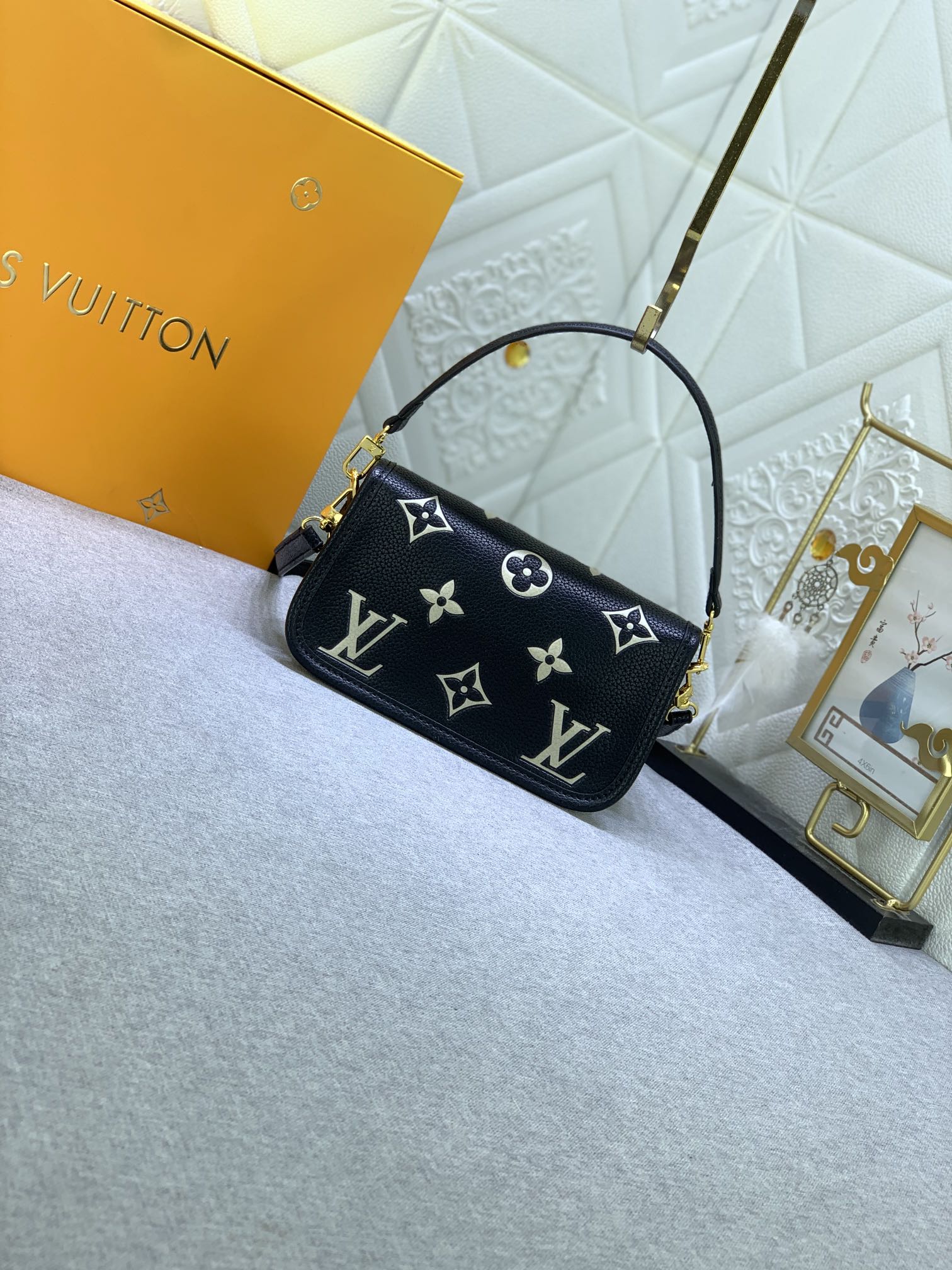 LV $74 gallery