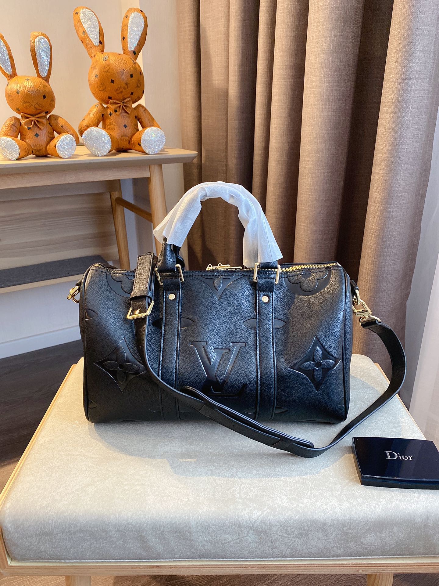 LV $77 gallery