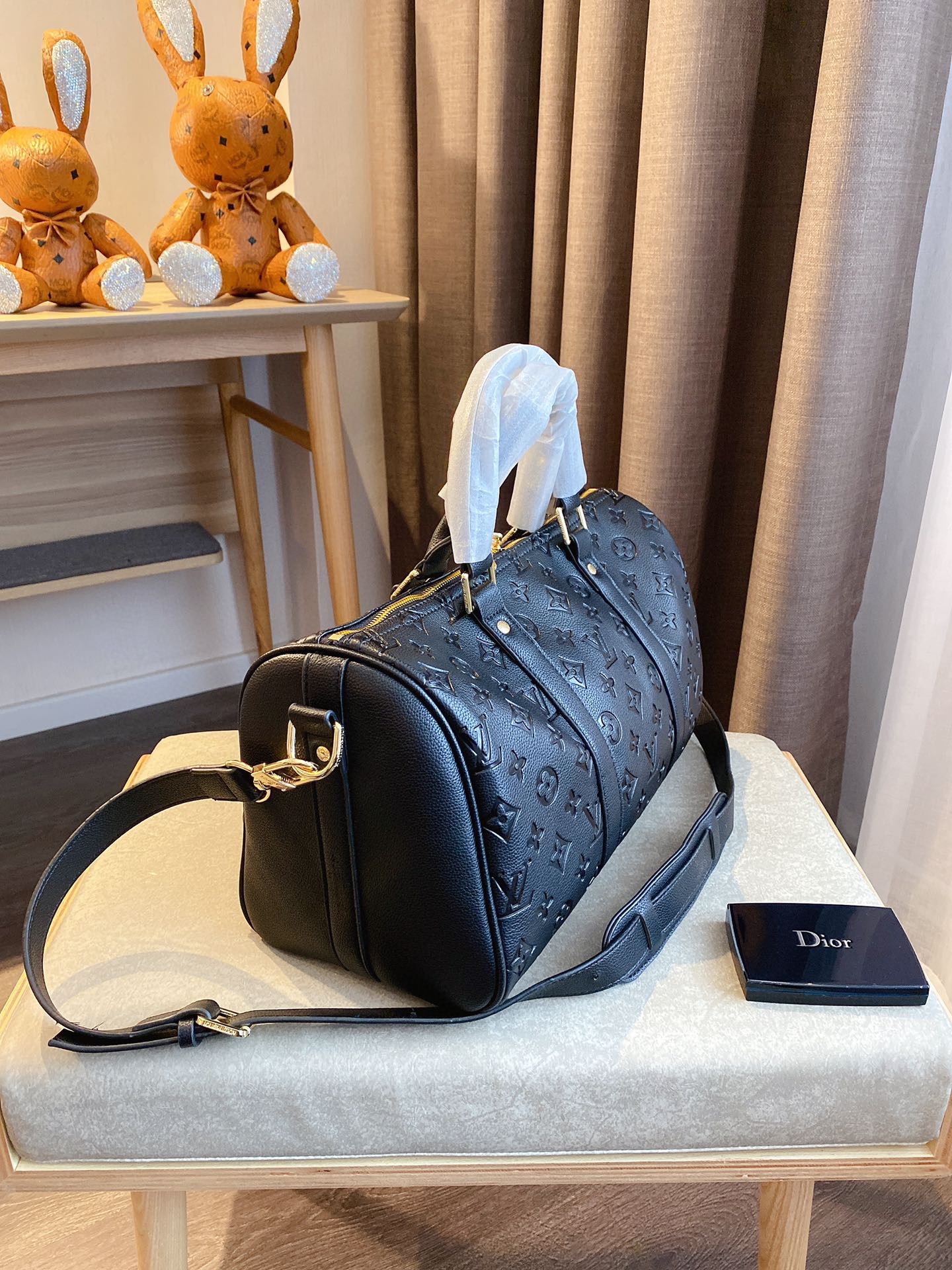 LV $77 gallery