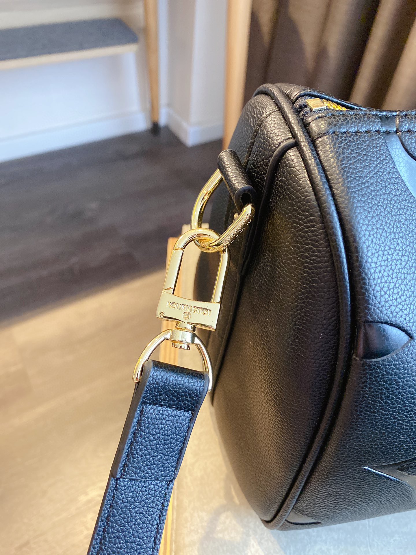 LV $77 gallery