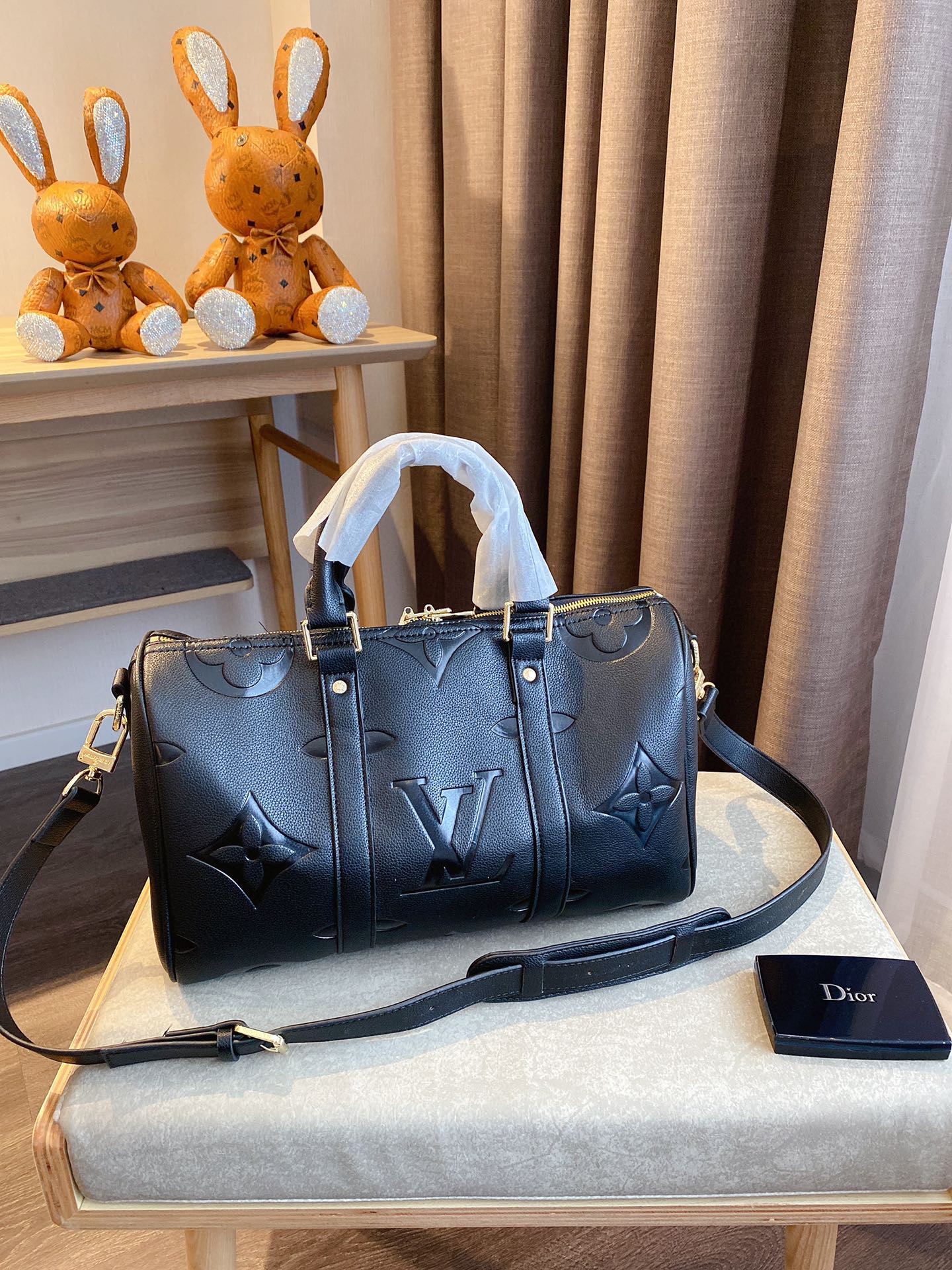 LV $77 gallery