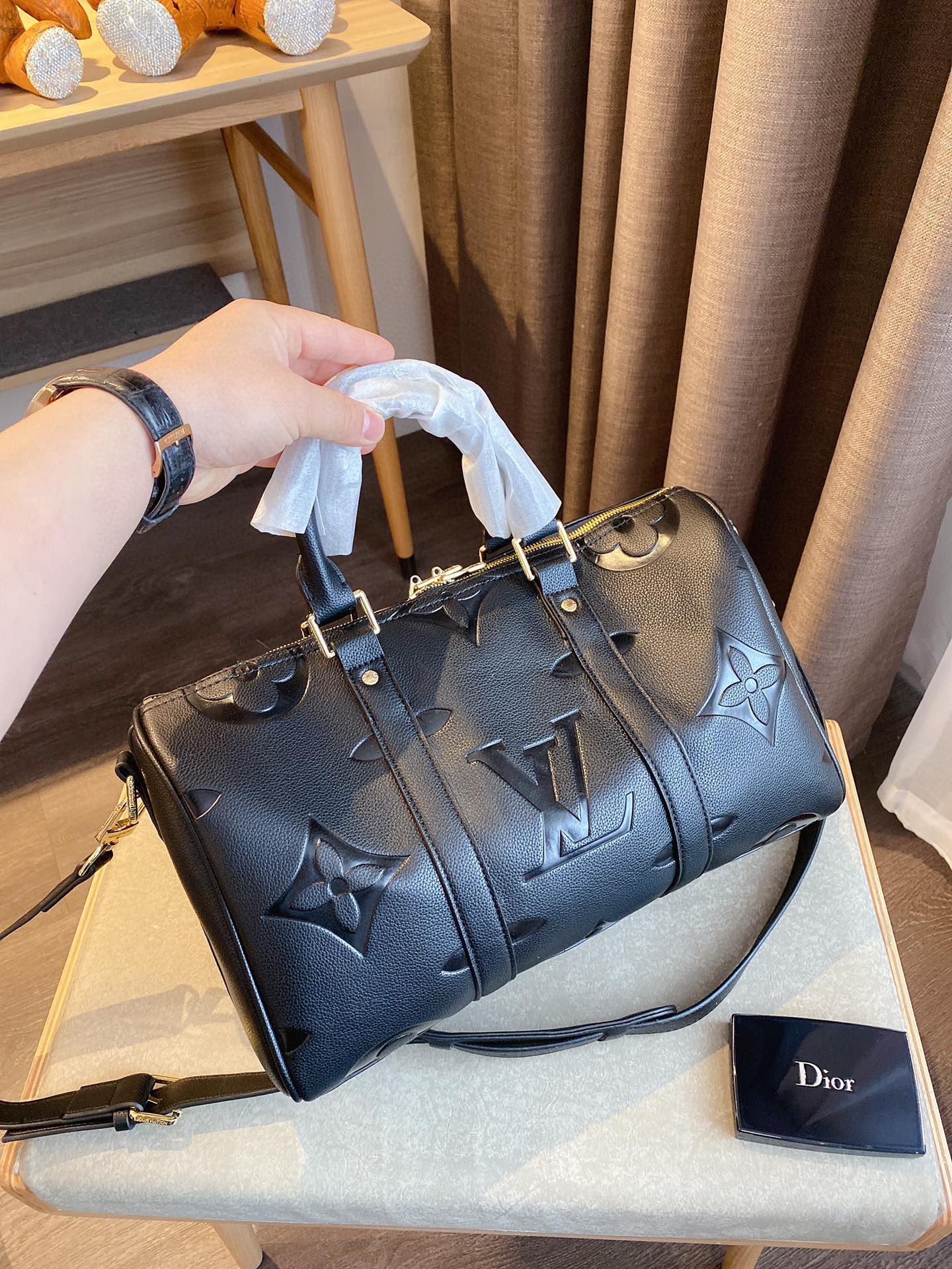 LV $77 gallery