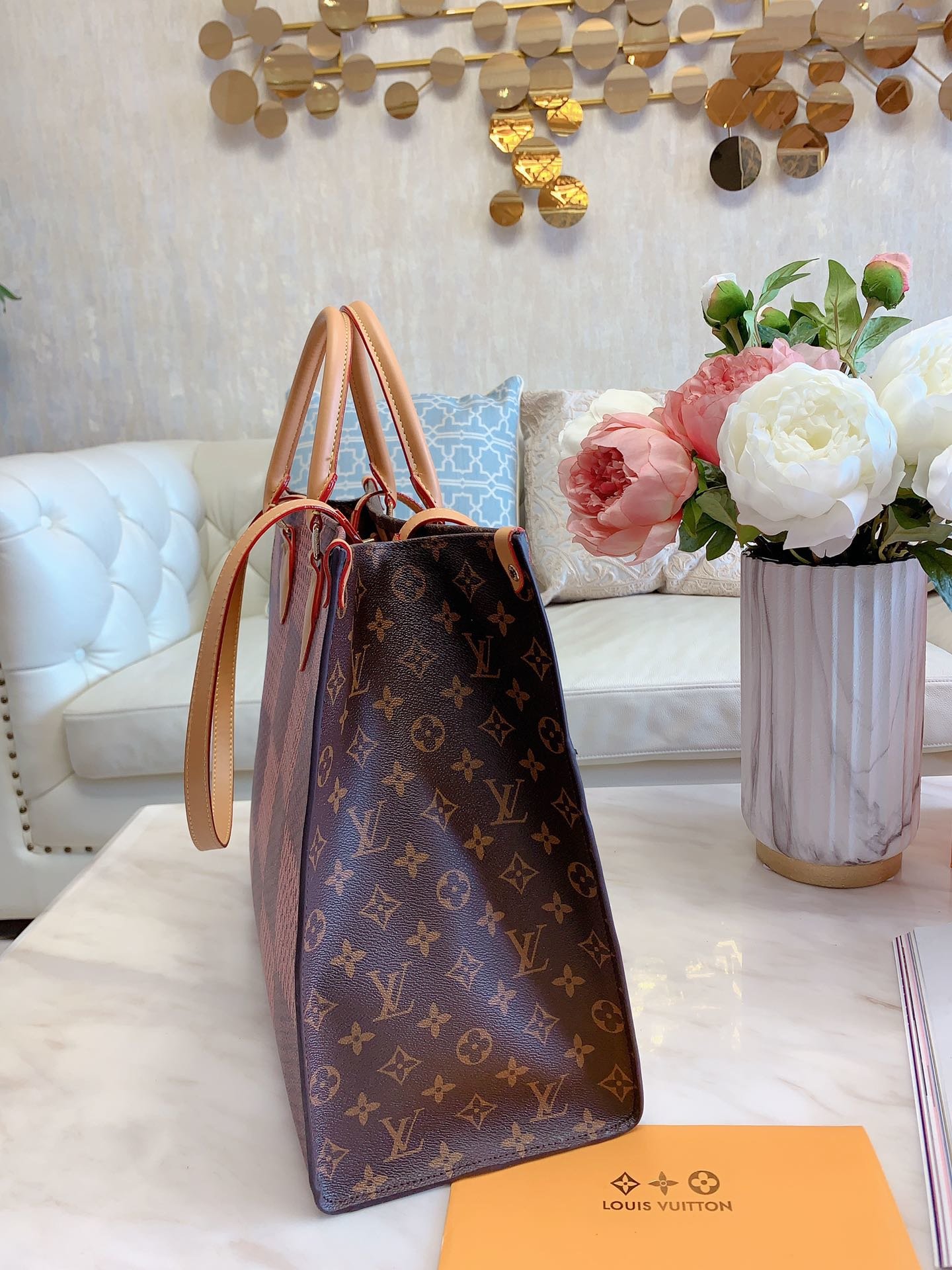 LV $77 gallery