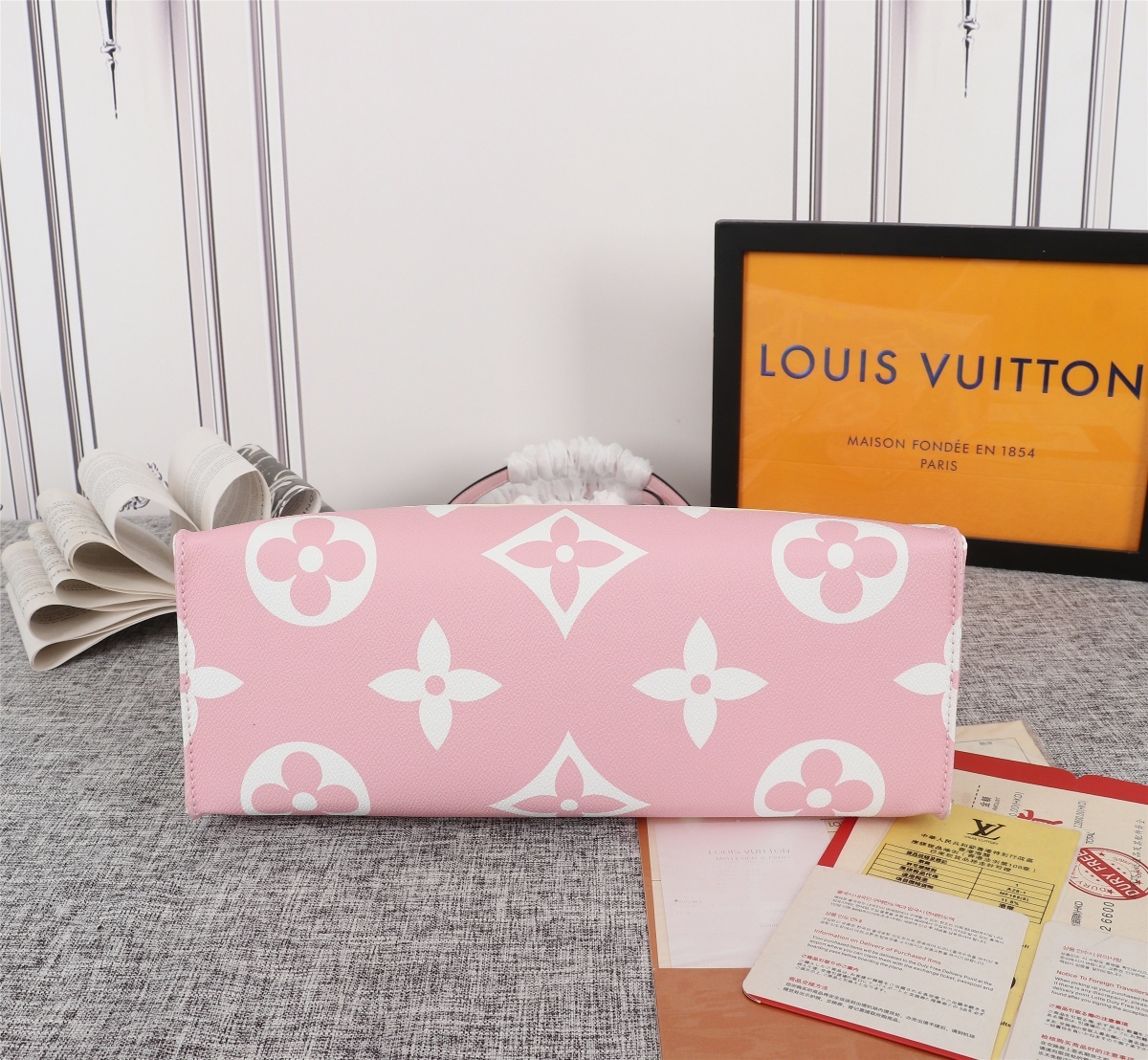 LV $77 gallery