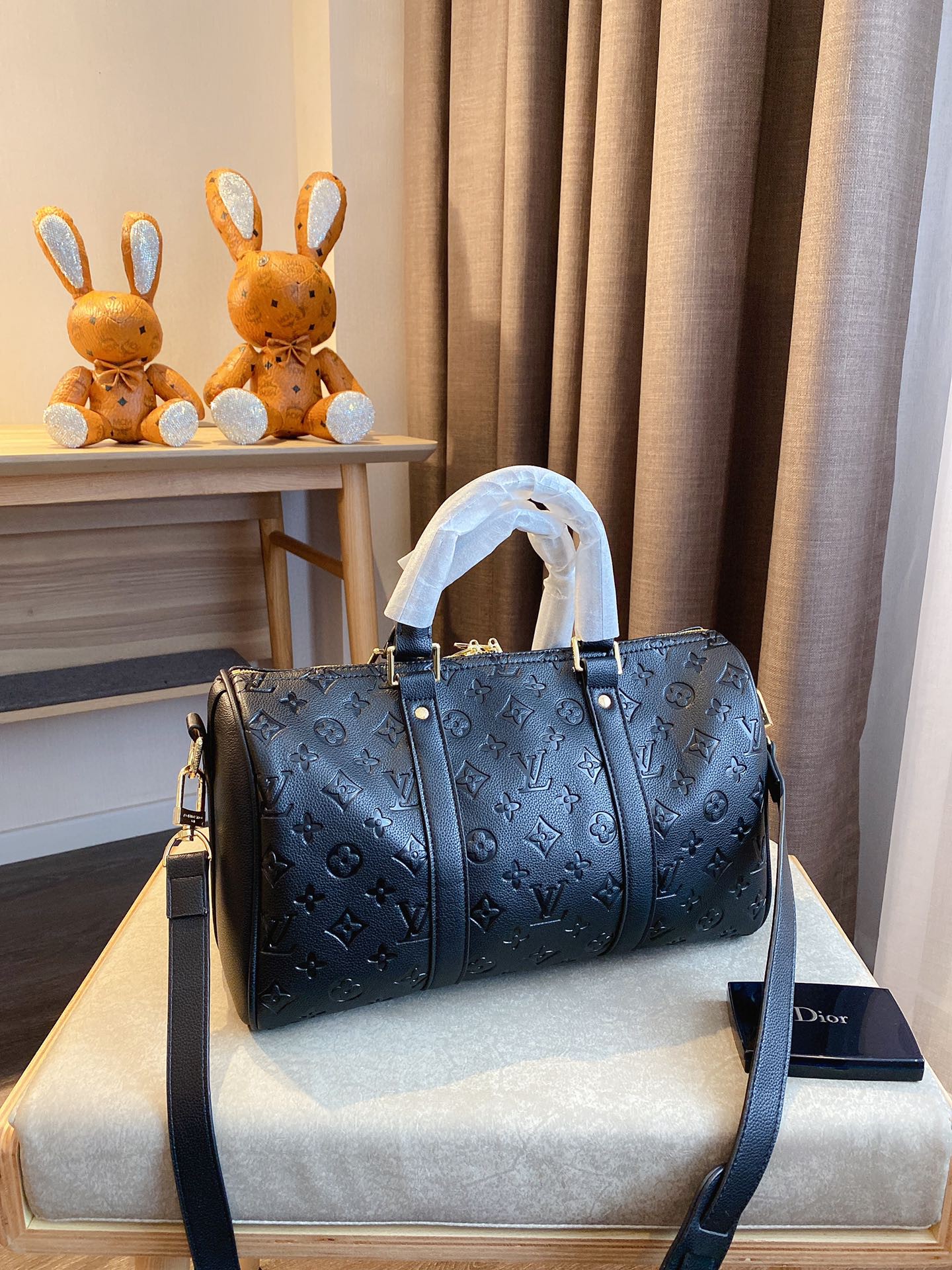 LV $77 gallery