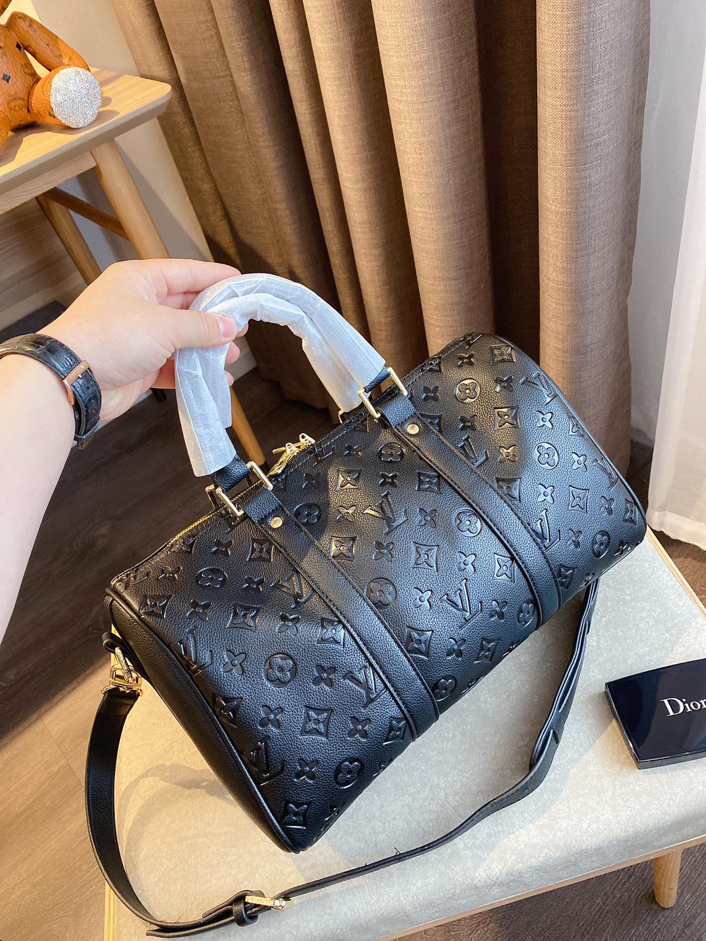 LV $77 gallery