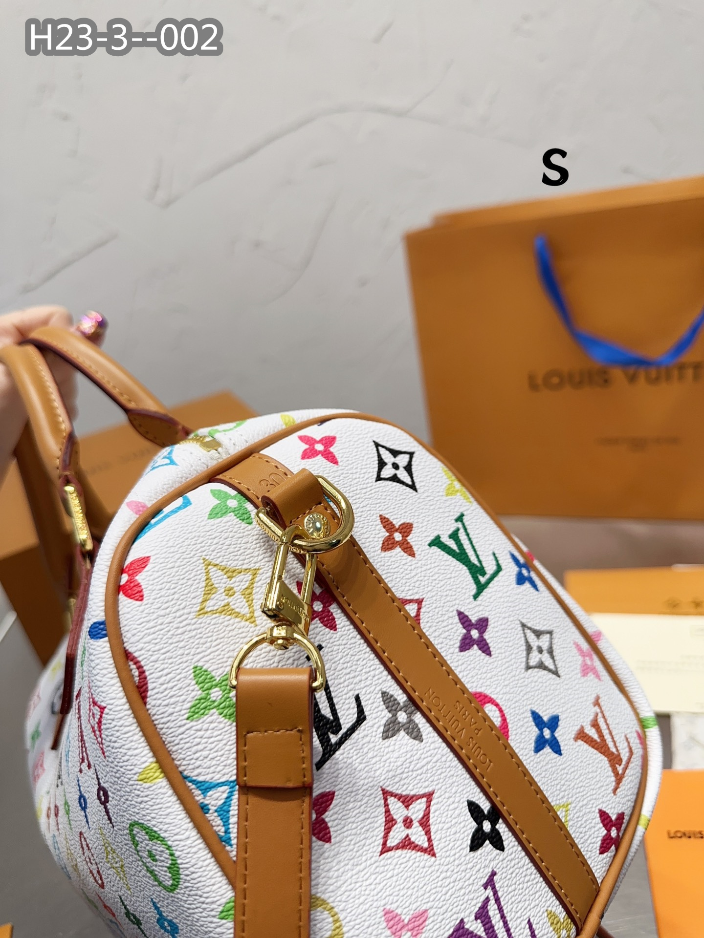 LV $77 gallery