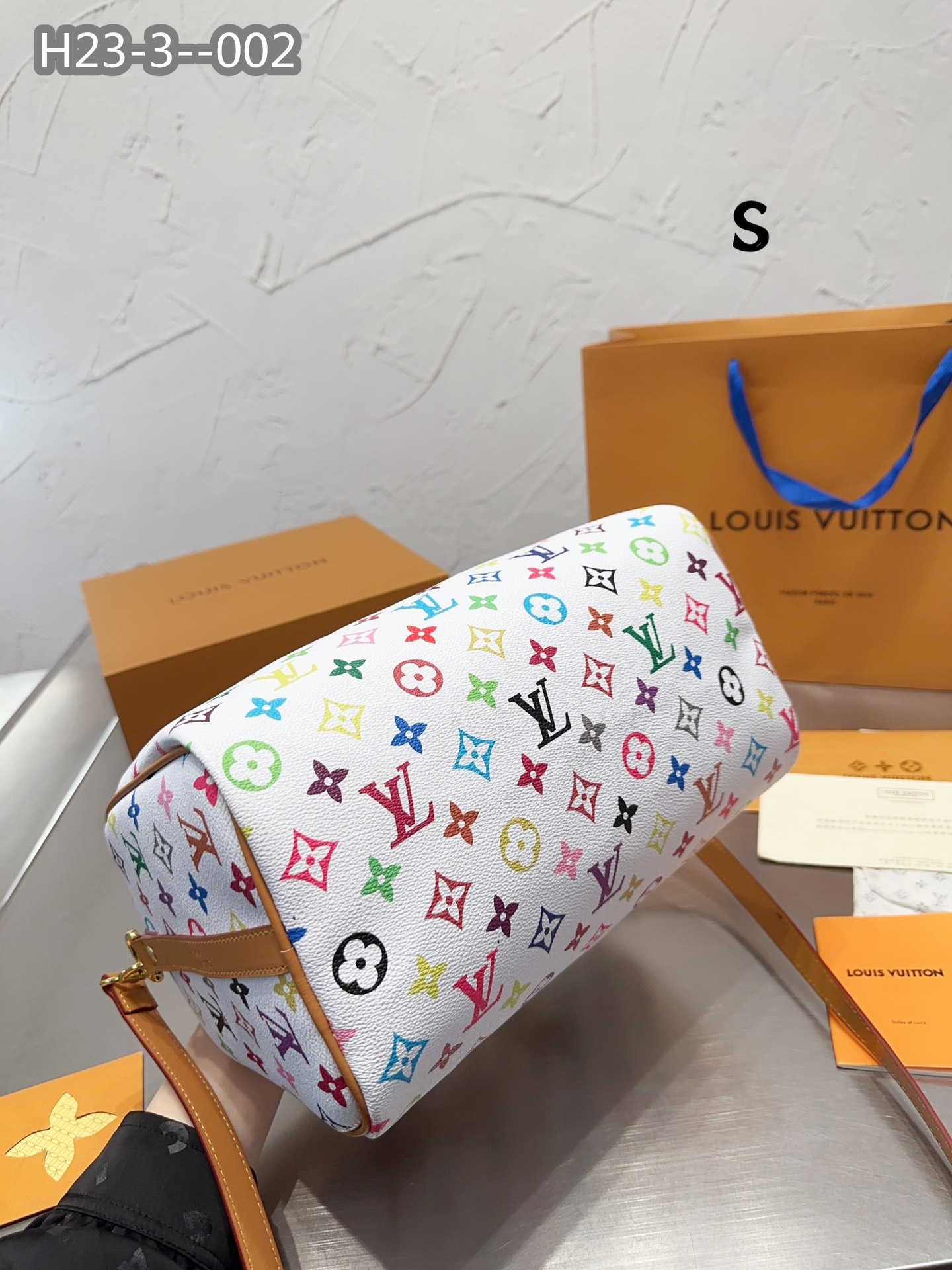 LV $77 gallery