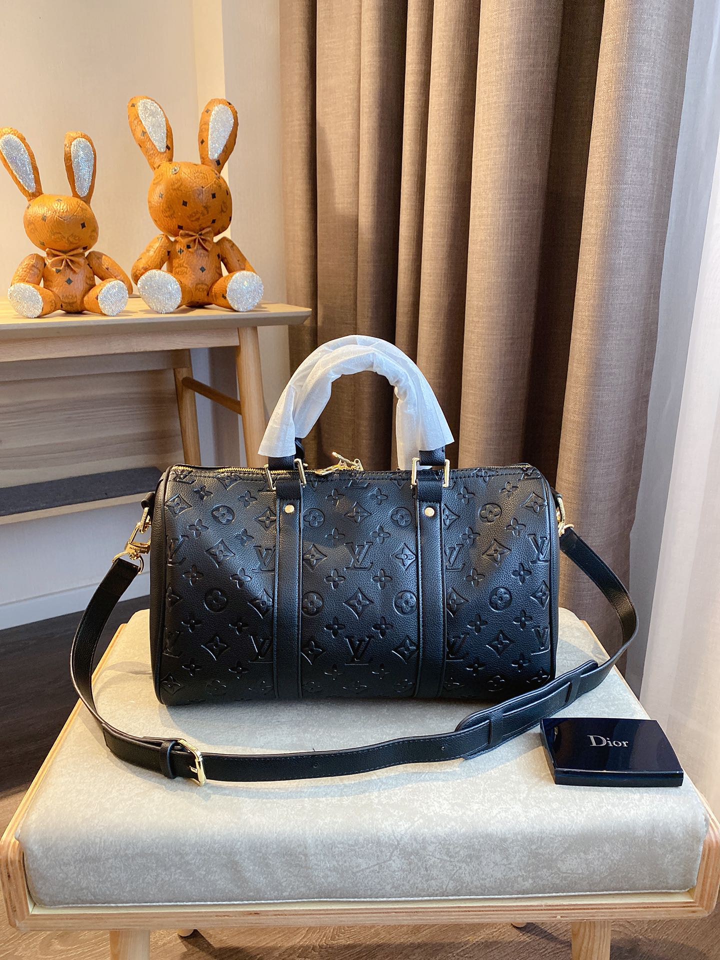 LV $77 gallery