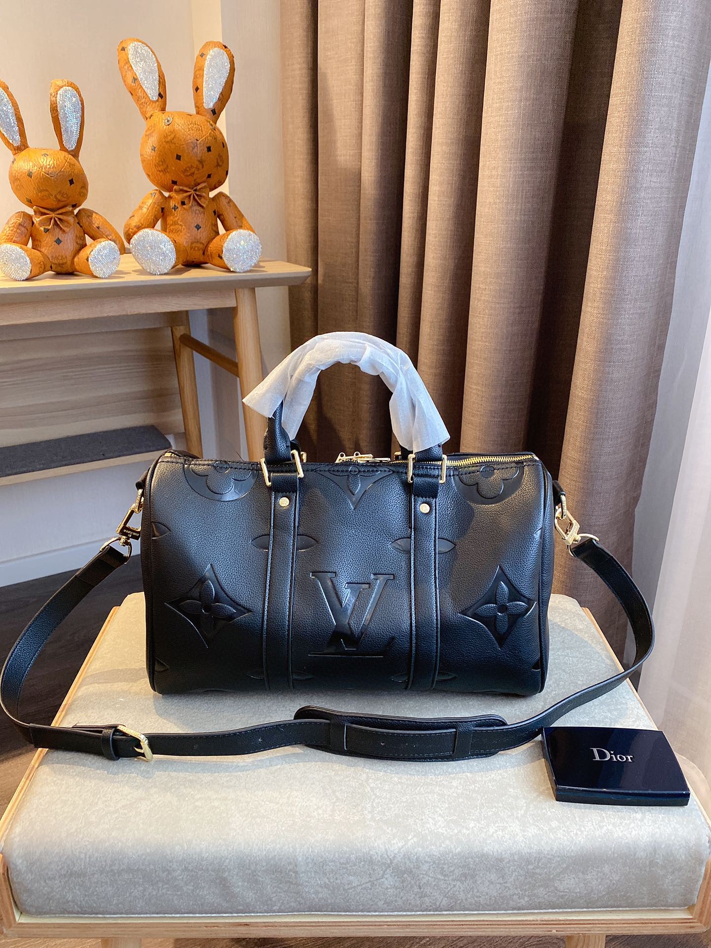 LV $77 gallery