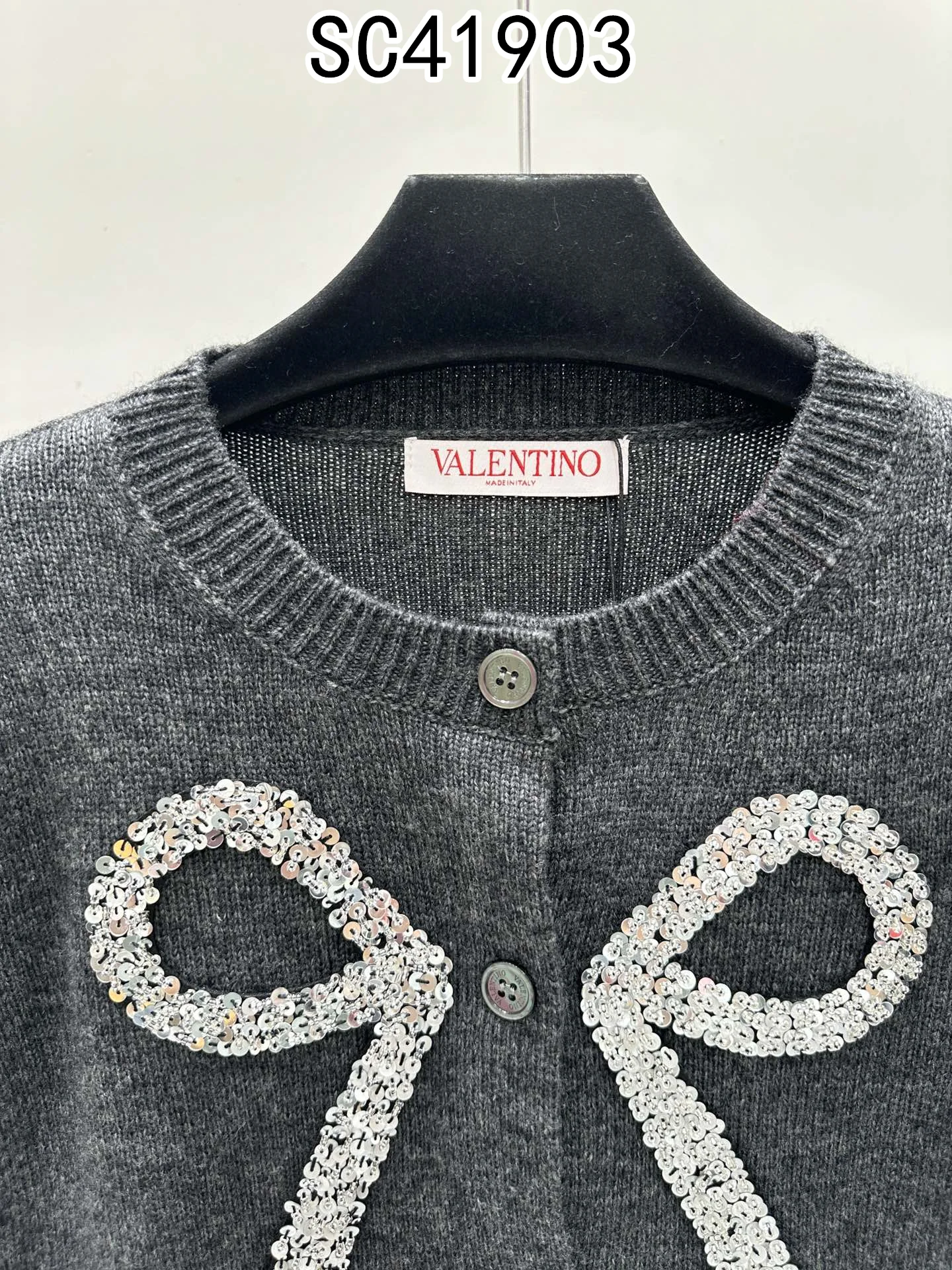 Valentino $70 gallery