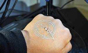 A New 3-D Printer System Can Print Electronics and Cells Directly on Your Skin