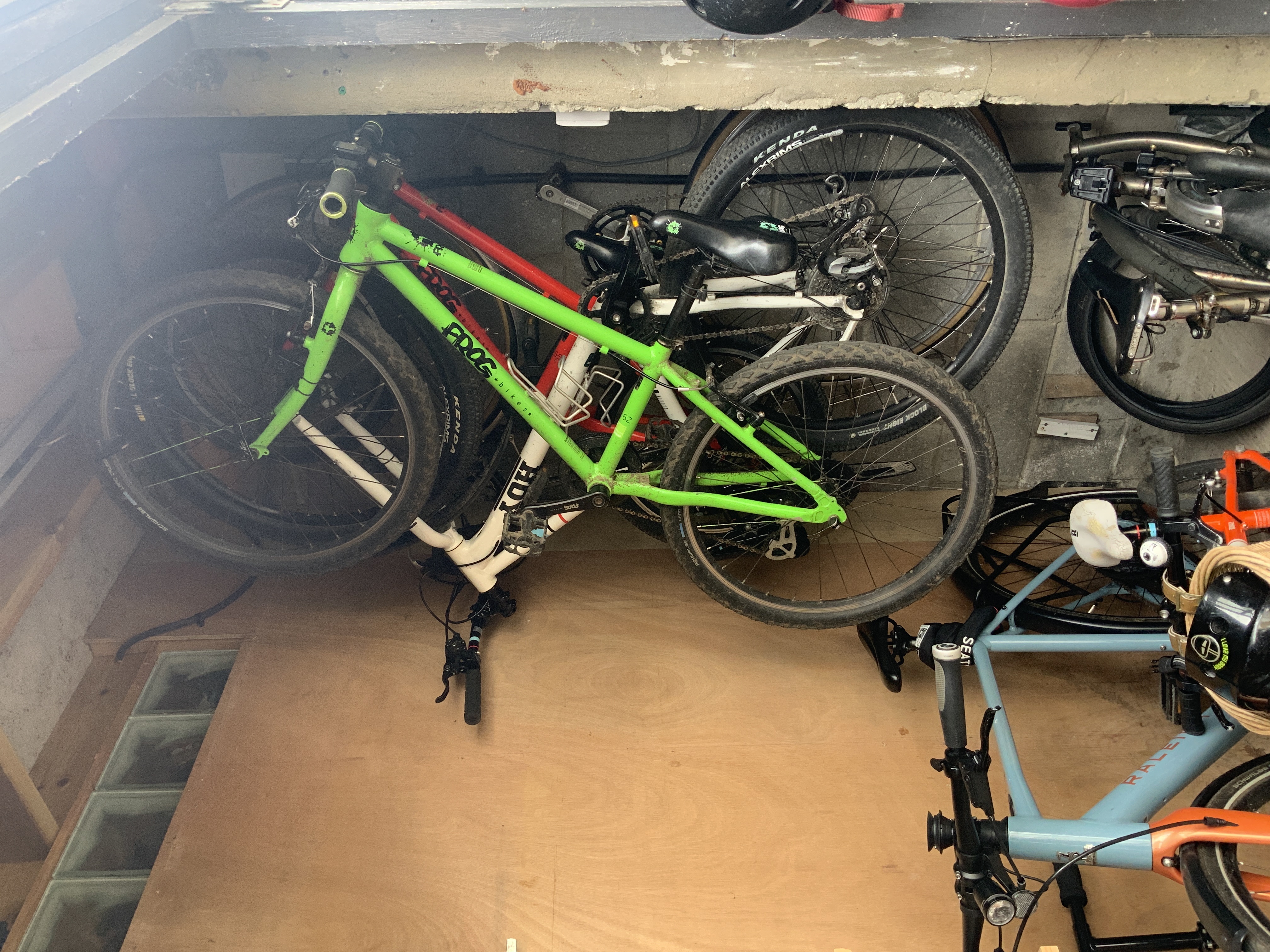 Ben's 7-bike SpaceRail ceiling setup in small garage section