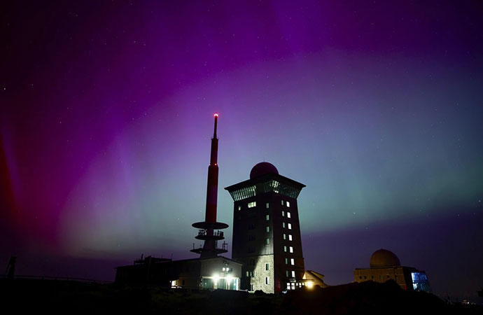 Solar storm hits Earth, producing colorful light shows across Northern Hemisphere