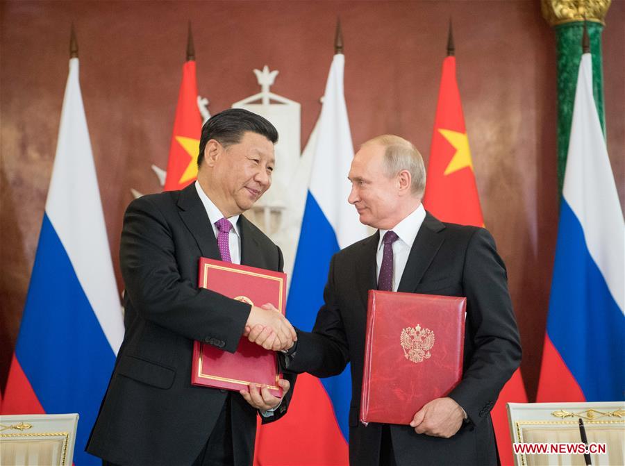 Xi, Putin lead bilateral ties into new era, embark on fresh journey of int'l cooperation