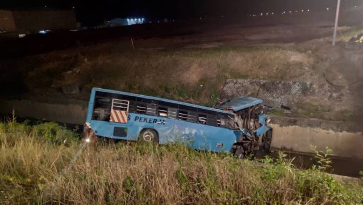 Ten dead after factory bus plunges into monsoon drain in Malaysia