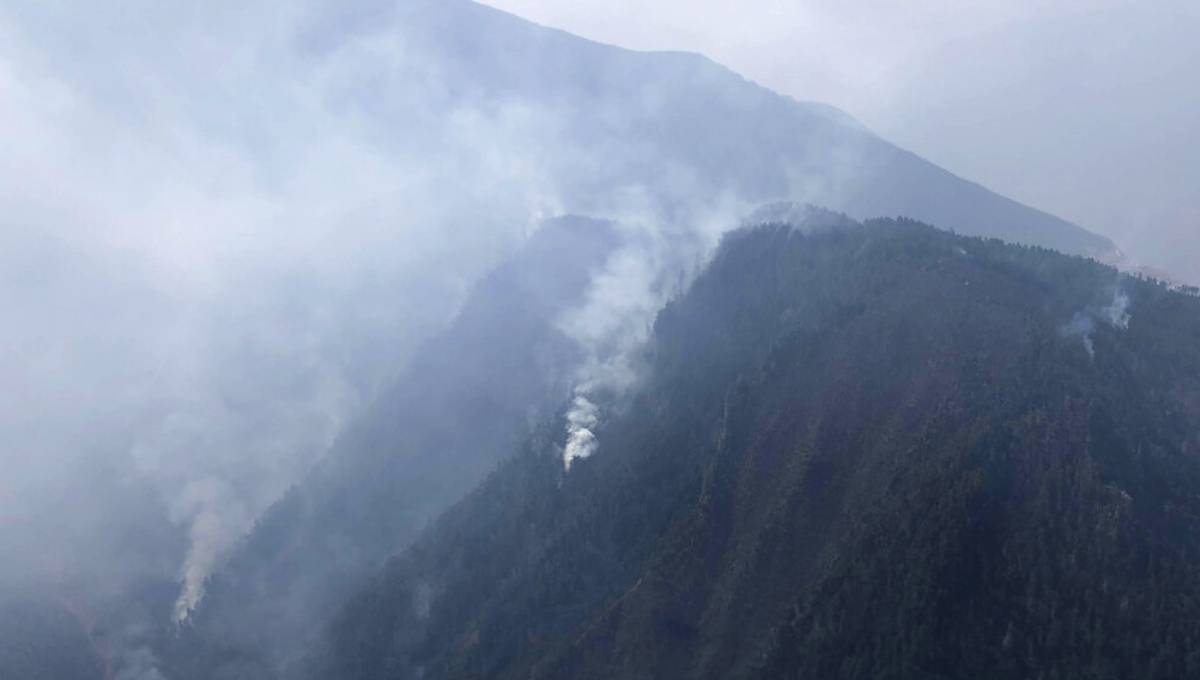 Firefighters contain fire in China's mountains where 30 died