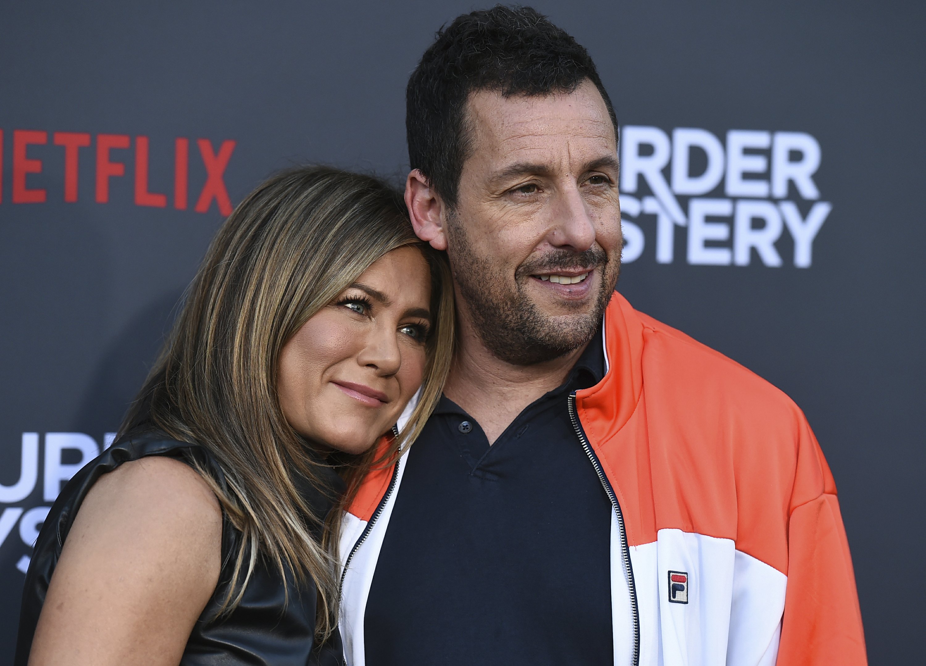 Aniston to Sandler before kissing scenes: 'Oil up the beard'