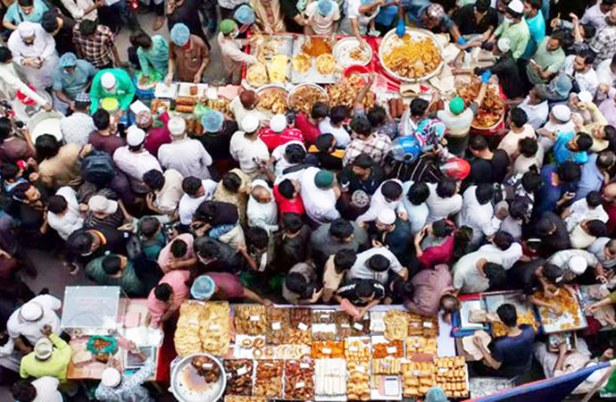 Historic Chawk Bazar comes alive with iftar items on first day of Ramadan