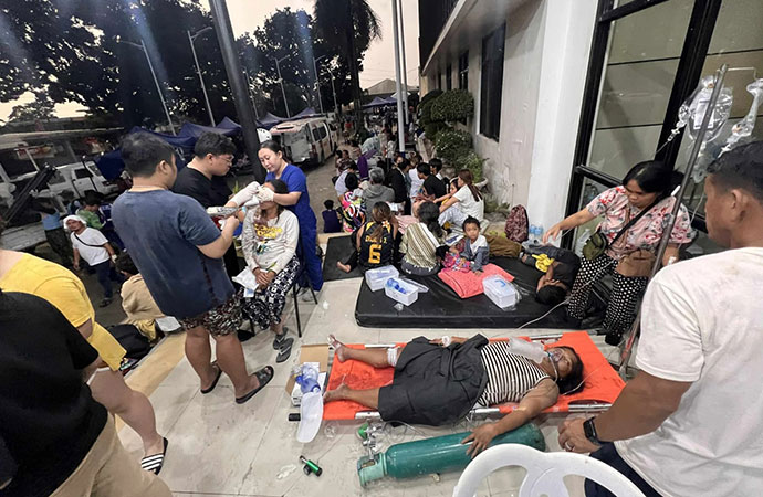 Rescuers used backhoes and sniffer dogs