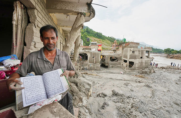 Mass burials in Nepal as death toll from flash floods exceeds 1,000